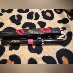 Elizabeth Arden Bold lipstick in the shade, extreme pink